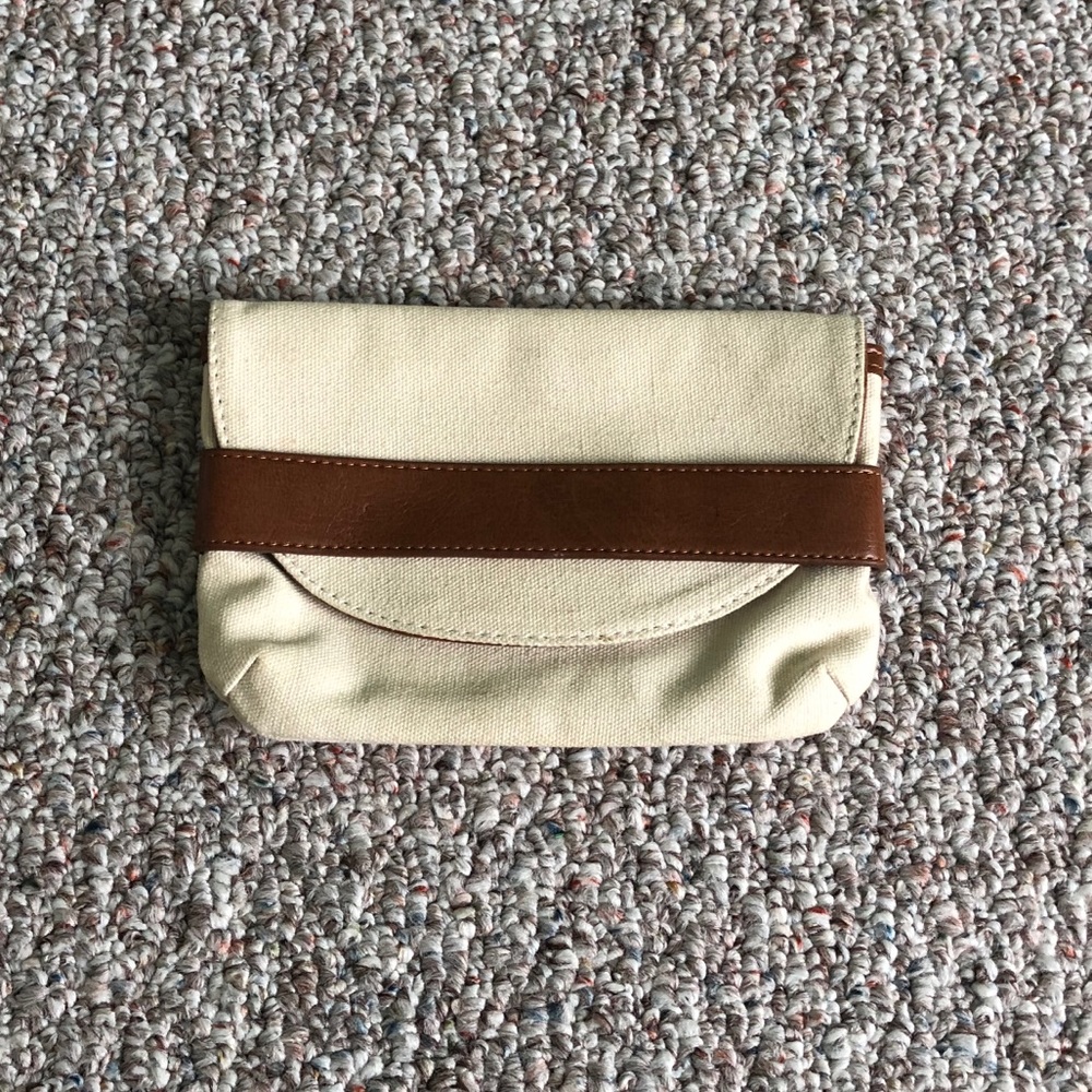 Cream and brown clutch